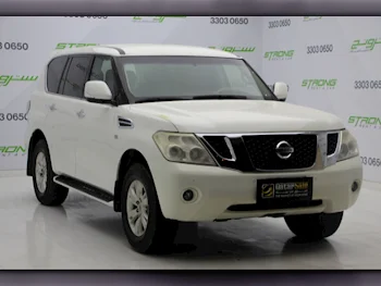  Nissan  Patrol  SE  2013  Automatic  230,000 Km  8 Cylinder  Four Wheel Drive (4WD)  SUV  White  With Warranty