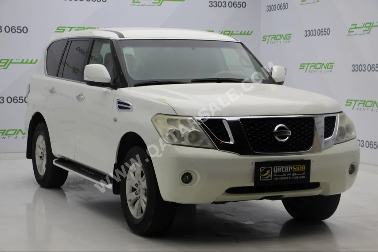  Nissan  Patrol  SE  2013  Automatic  230,000 Km  8 Cylinder  Four Wheel Drive (4WD)  SUV  White  With Warranty