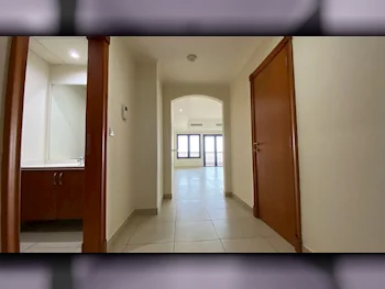 3 Bedrooms  Apartment  For Rent  in Doha -  The Pearl  Semi Furnished