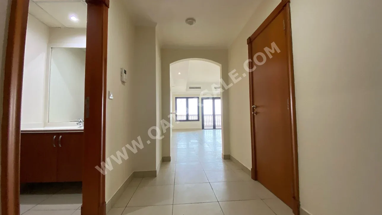 3 Bedrooms  Apartment  For Rent  in Doha -  The Pearl  Semi Furnished