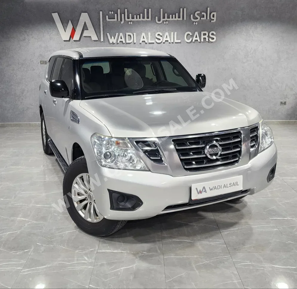 Nissan  Patrol  SE  2016  Automatic  180٬000 Km  8 Cylinder  Four Wheel Drive (4WD)  SUV  Silver