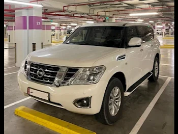 Nissan  Patrol  SE  2015  Automatic  128,000 Km  8 Cylinder  Four Wheel Drive (4WD)  SUV  White