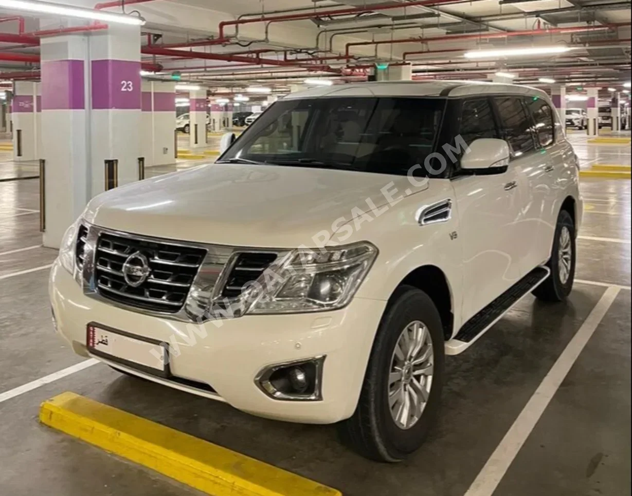 Nissan  Patrol  SE  2015  Automatic  128,000 Km  8 Cylinder  Four Wheel Drive (4WD)  SUV  White