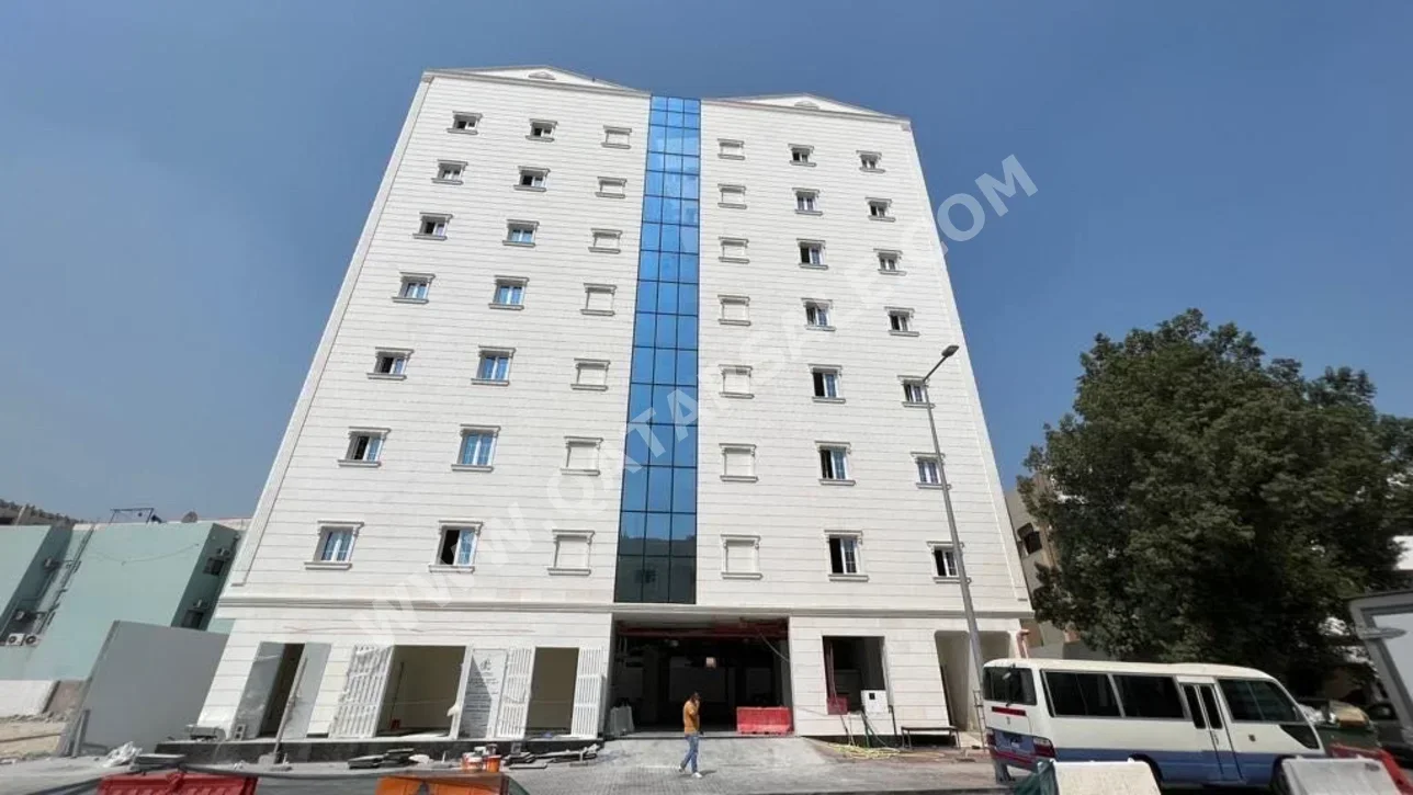 Buildings, Towers & Compounds - Commercial  - Doha  - Al Mansoura  For Sale