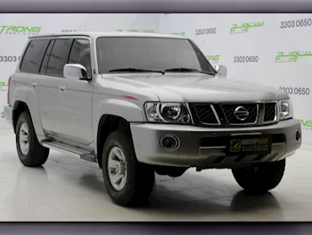  Nissan  Patrol  Safari  2023  Manual  60,000 Km  6 Cylinder  Four Wheel Drive (4WD)  SUV  Silver  With Warranty