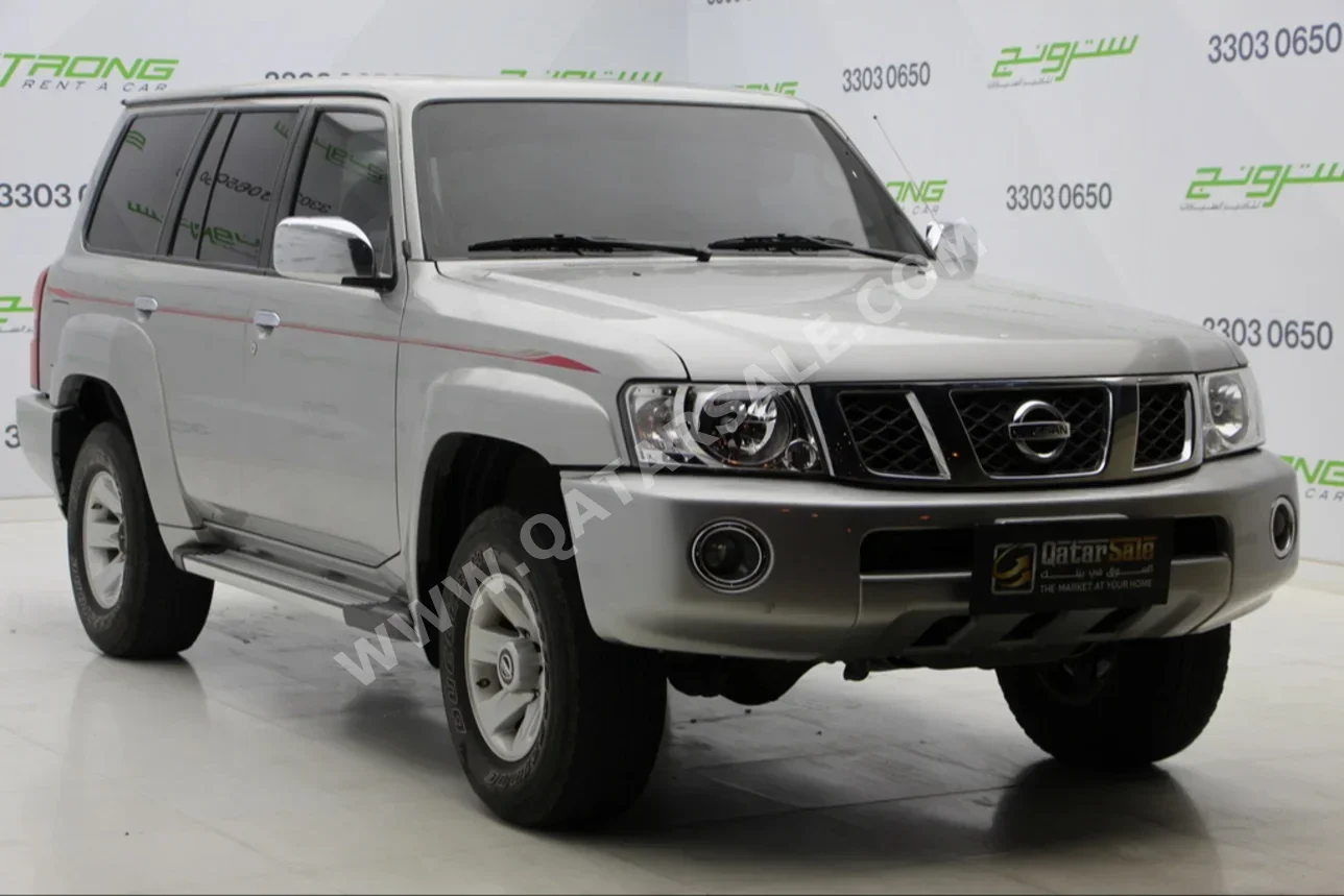  Nissan  Patrol  Safari  2023  Manual  60,000 Km  6 Cylinder  Four Wheel Drive (4WD)  SUV  Silver  With Warranty