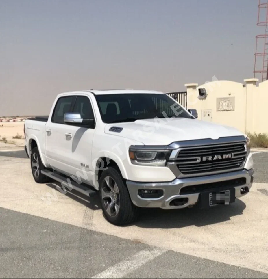 Dodge  Ram  1500 Laramie  2019  Automatic  82,000 Km  8 Cylinder  Four Wheel Drive (4WD)  Pick Up  Pearl  With Warranty