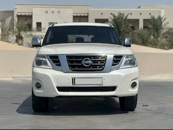 Nissan  Patrol  Platinum  2015  Automatic  398,000 Km  8 Cylinder  Four Wheel Drive (4WD)  SUV  White