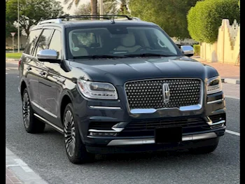 Lincoln  Navigator  Presidential  2021  Automatic  124,000 Km  6 Cylinder  All Wheel Drive (AWD)  SUV  Dark Blue  With Warranty