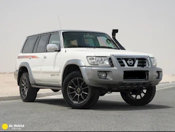 Nissan  Patrol  Super Safari  2004  Automatic  249,000 Km  6 Cylinder  Four Wheel Drive (4WD)  SUV  White