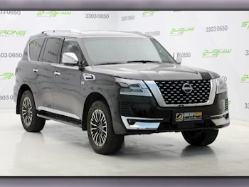 Nissan  Patrol  Platinum  2013  Automatic  9,700 Km  8 Cylinder  Four Wheel Drive (4WD)  SUV  Black