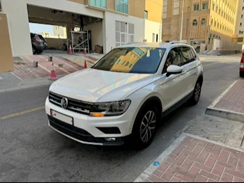 Volkswagen  Tiguan  2.0 TSI  2019  Automatic  42,000 Km  4 Cylinder  All Wheel Drive (AWD)  SUV  White