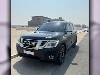 Nissan  Patrol  Platinum  2014  Automatic  240,000 Km  8 Cylinder  Four Wheel Drive (4WD)  SUV  Black