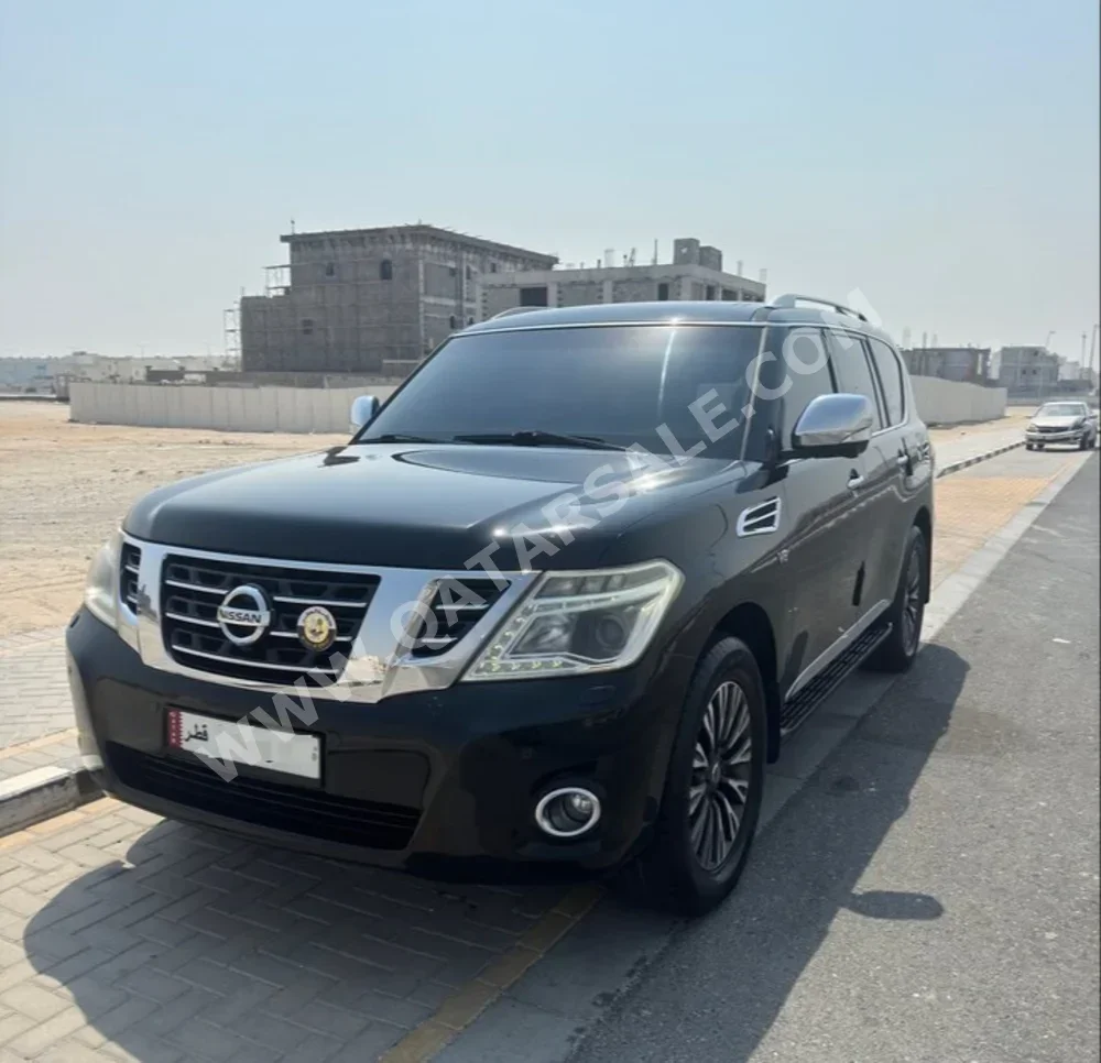 Nissan  Patrol  Platinum  2014  Automatic  240,000 Km  8 Cylinder  Four Wheel Drive (4WD)  SUV  Black