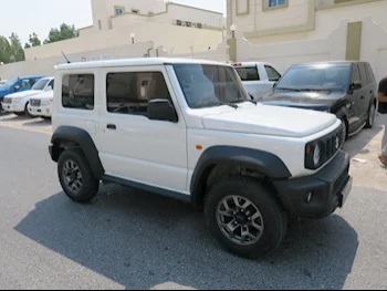 Suzuki  Jimny  2023  Manual  14,000 Km  4 Cylinder  Four Wheel Drive (4WD)  SUV  White  With Warranty