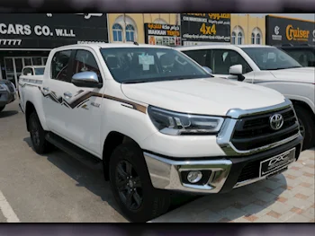 Toyota  Hilux  2024  Automatic  0 Km  4 Cylinder  Four Wheel Drive (4WD)  Pick Up  White  With Warranty