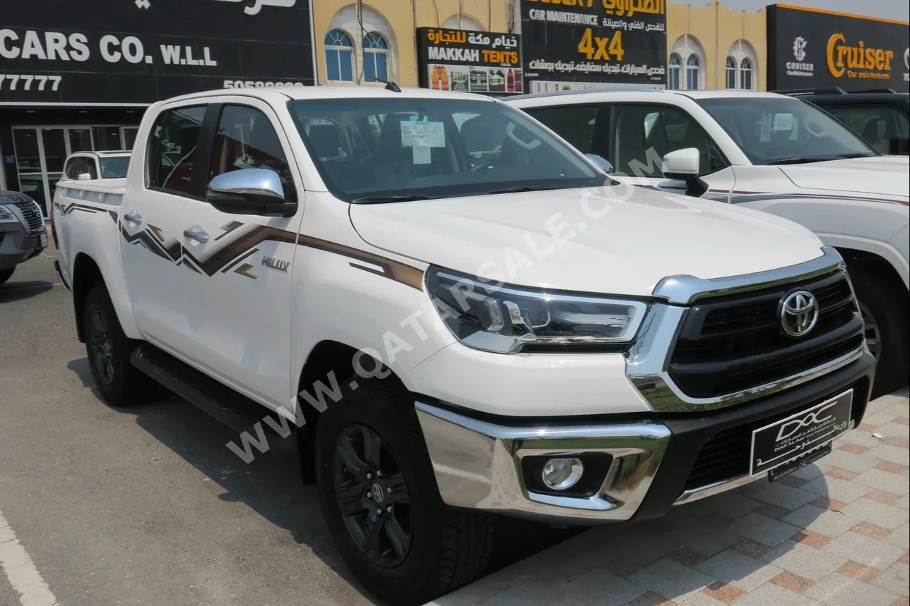 Toyota  Hilux  2024  Automatic  0 Km  4 Cylinder  Four Wheel Drive (4WD)  Pick Up  White  With Warranty