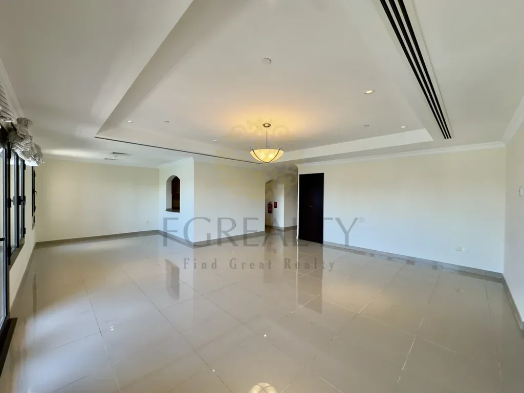 2 Bedrooms  Apartment  For Rent  in Doha -  The Pearl  Not Furnished