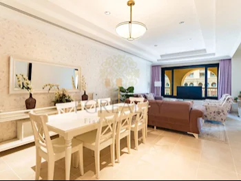 2 Bedrooms  Apartment  For Rent  in Doha -  The Pearl  Fully Furnished