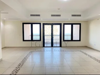 3 Bedrooms  Apartment  For Rent  in Doha -  The Pearl  Not Furnished