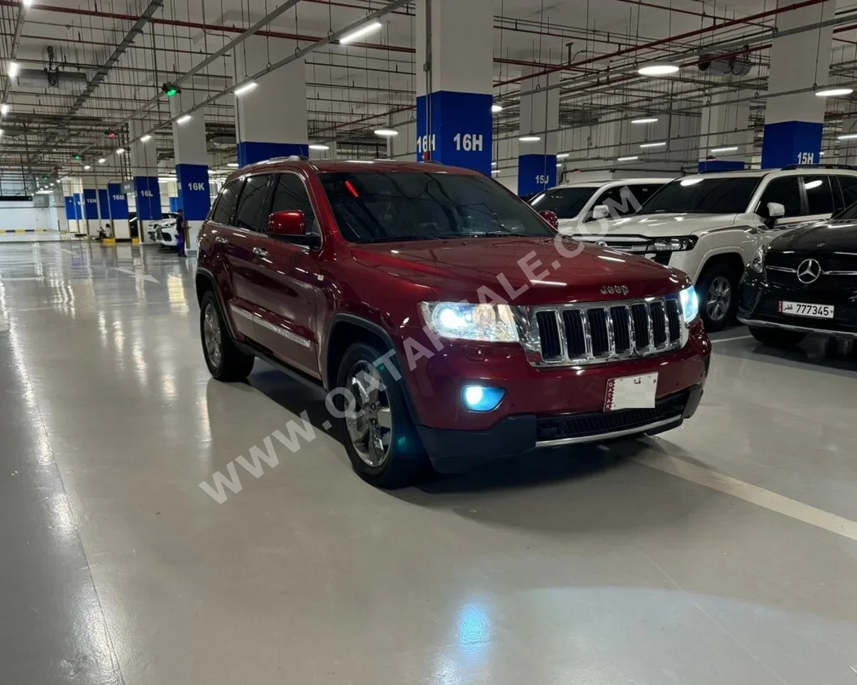 Jeep  Grand Cherokee  Overland  2013  Automatic  155,500 Km  8 Cylinder  Four Wheel Drive (4WD)  SUV  Maroon