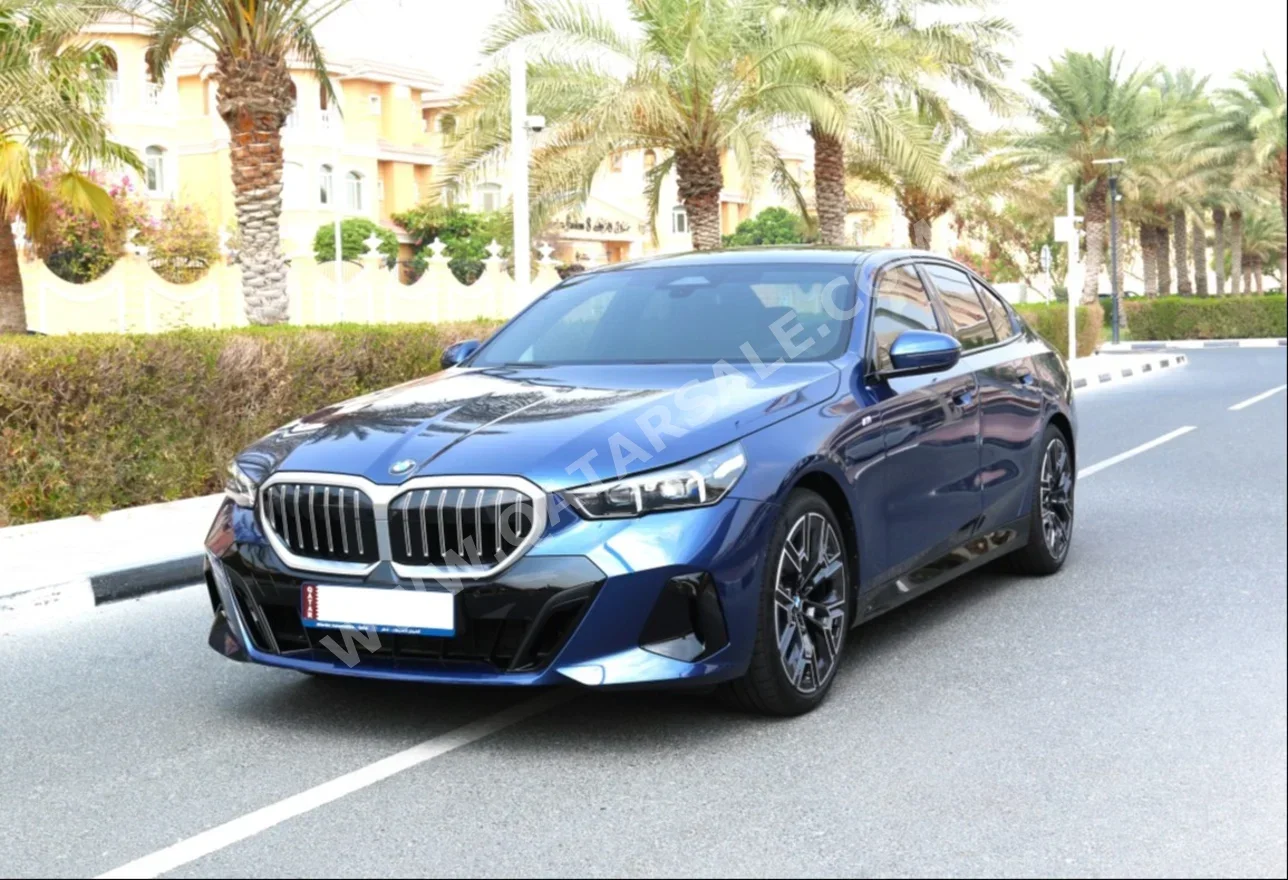 BMW  520 I  4 Cylinder  Sedan  Blue  2024