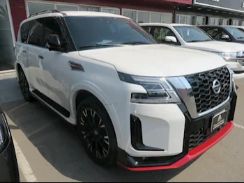 Nissan  Patrol  Nismo  2020  Automatic  93,000 Km  8 Cylinder  Four Wheel Drive (4WD)  SUV  White  With Warranty