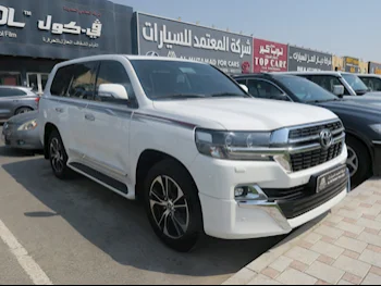 Toyota  Land Cruiser  GXR- Grand Touring  2021  Automatic  120,000 Km  8 Cylinder  Four Wheel Drive (4WD)  SUV  White