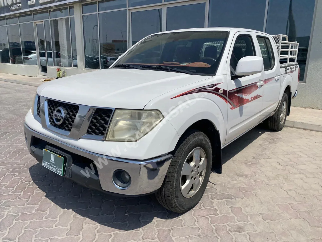 Nissan  Pickup  2015  Manual  287,000 Km  4 Cylinder  Rear Wheel Drive (RWD)  Pick Up  White