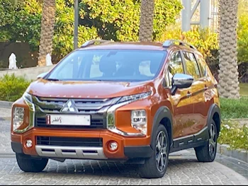 Mitsubishi  Xpander  2023  Automatic  30,000 Km  4 Cylinder  Front Wheel Drive (FWD)  SUV  Orange  With Warranty