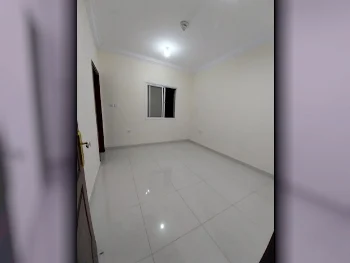 3 Bedrooms  Apartment  in Doha -  Al Mansoura  Not Furnished