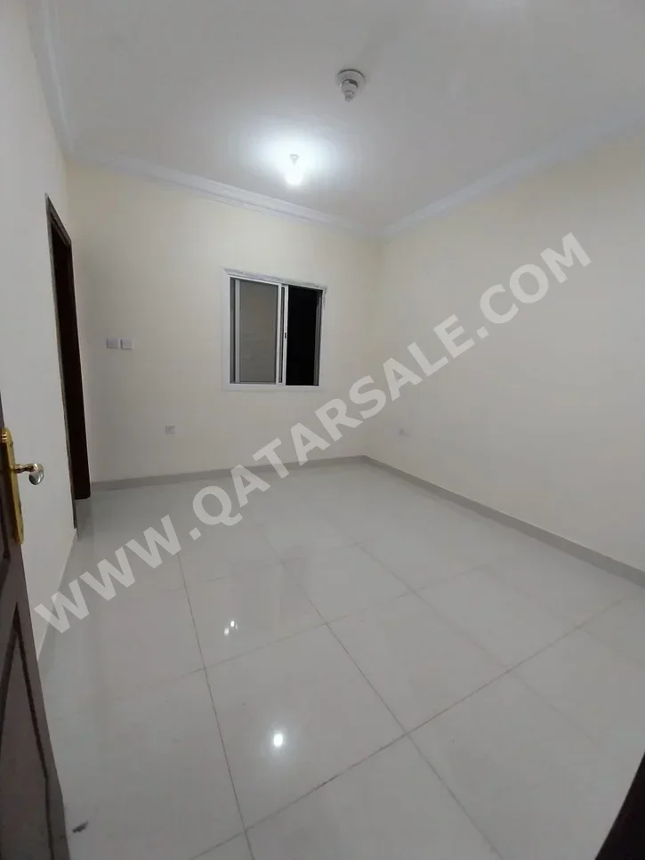 3 Bedrooms  Apartment  in Doha -  Al Mansoura  Not Furnished