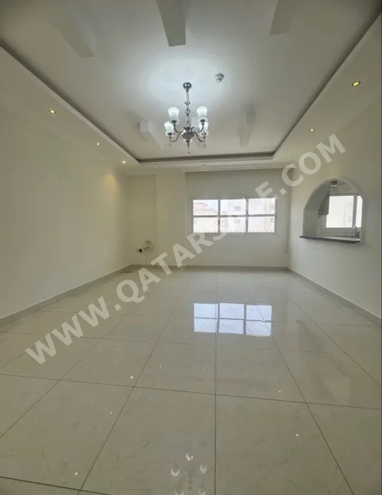 3 Bedrooms  Apartment  in Doha -  Al Mansoura  Semi Furnished