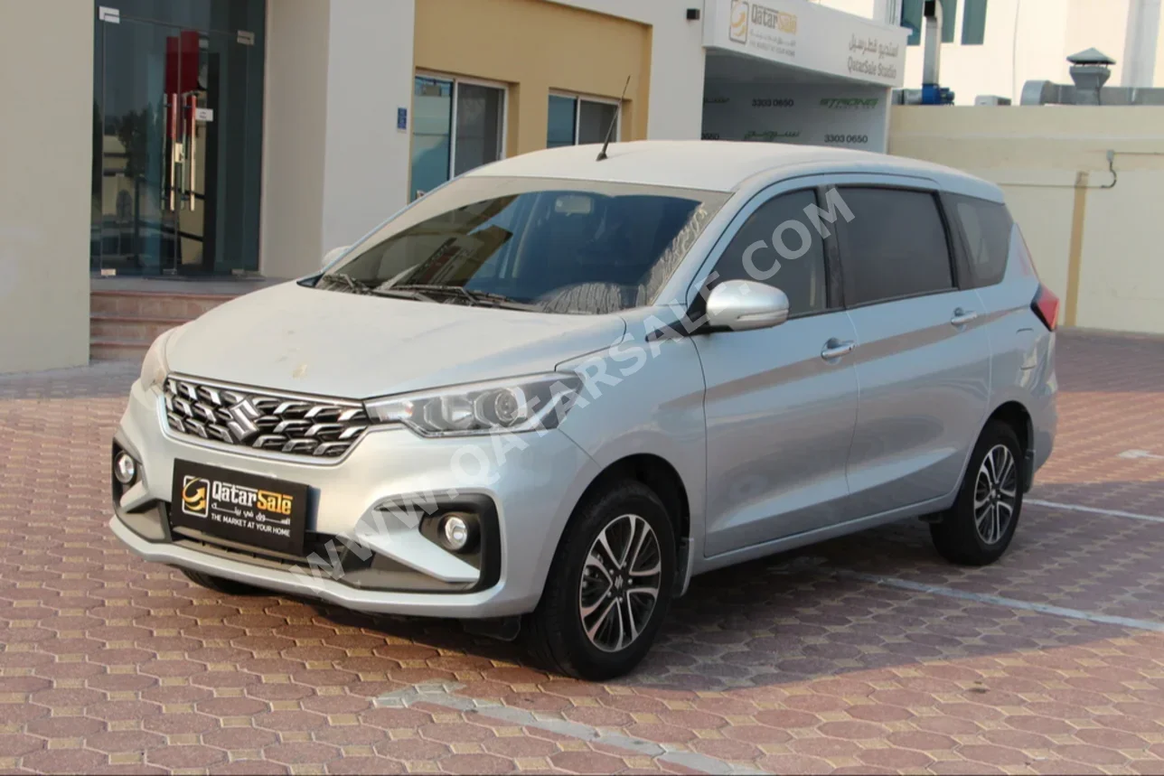 Suzuki  Ertiga  GLX  2024  Automatic  18,000 Km  4 Cylinder  Front Wheel Drive (FWD)  SUV  Silver  With Warranty