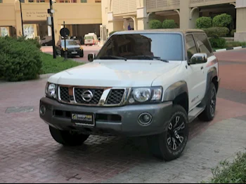 Nissan  Patrol  Super Safari  2023  Automatic  38,000 Km  6 Cylinder  Four Wheel Drive (4WD)  SUV  White  With Warranty