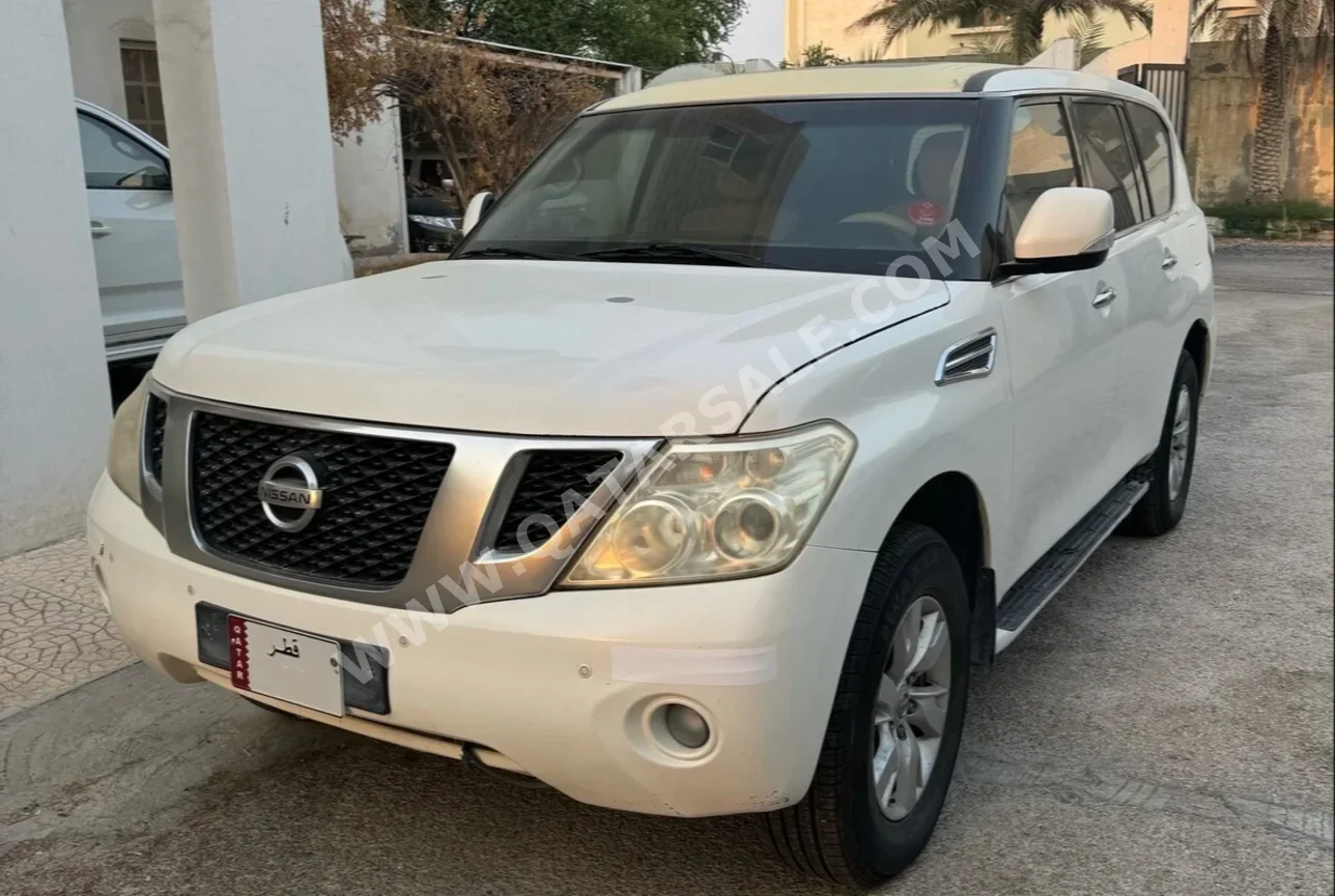 Nissan  Patrol  SE  2012  Automatic  241,147 Km  8 Cylinder  Four Wheel Drive (4WD)  SUV  White