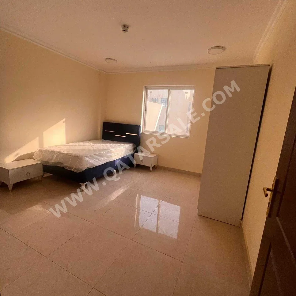 2 Bedrooms  Apartment  For Rent  in Doha -  Fereej Kulaib  Semi Furnished