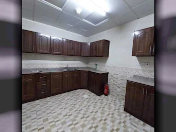 3 Bedrooms  Apartment  For Rent  in Doha -  Al Mansoura  Not Furnished