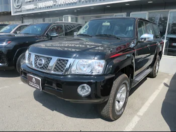 Nissan  Patrol  Safari  2024  Manual  0 Km  6 Cylinder  Four Wheel Drive (4WD)  SUV  Black  With Warranty