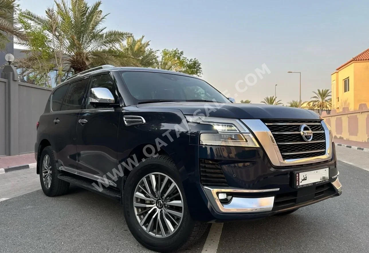 Nissan  Patrol  Platinum  2020  Automatic  95,000 Km  6 Cylinder  All Wheel Drive (AWD)  SUV  Blue  With Warranty