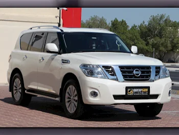 Nissan  Patrol  LE Titanium  2019  Automatic  62,000 Km  8 Cylinder  Four Wheel Drive (4WD)  SUV  White