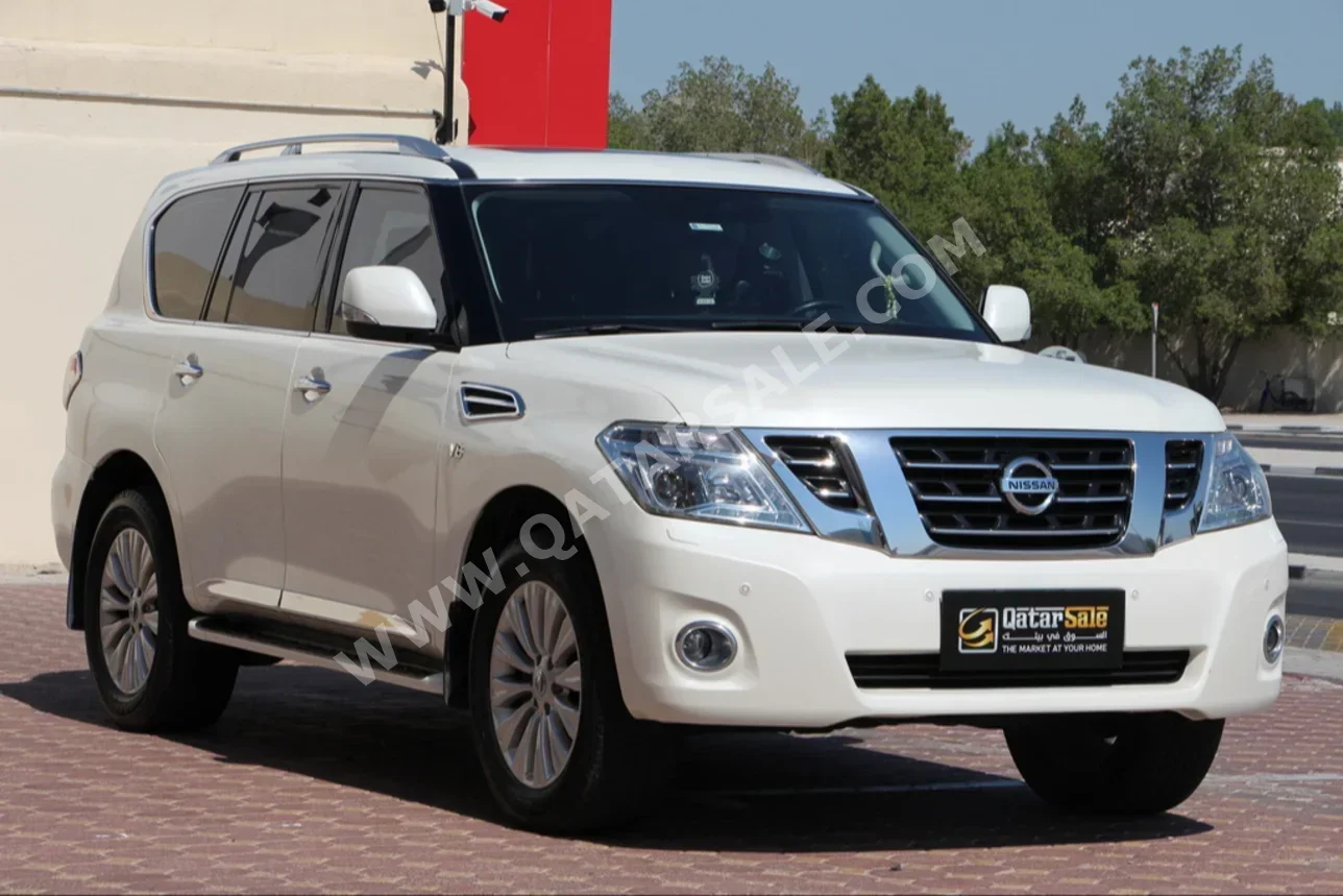 Nissan  Patrol  LE Titanium  2019  Automatic  62,000 Km  8 Cylinder  Four Wheel Drive (4WD)  SUV  White