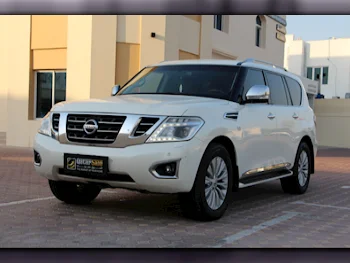 Nissan  Patrol  Platinum  2015  Automatic  274,000 Km  8 Cylinder  Four Wheel Drive (4WD)  SUV  White