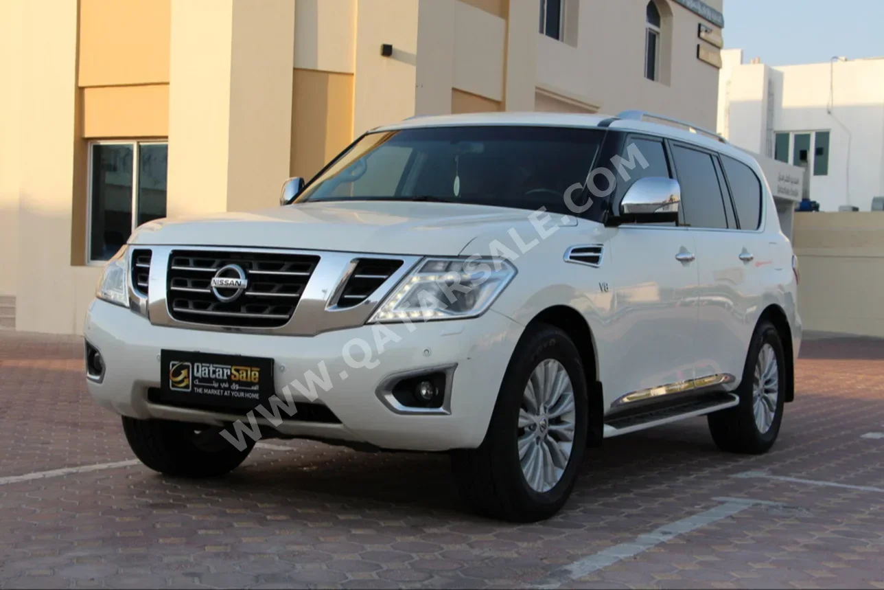 Nissan  Patrol  Platinum  2015  Automatic  274,000 Km  8 Cylinder  Four Wheel Drive (4WD)  SUV  White