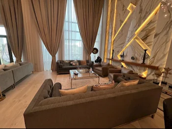 5 Bedrooms  Apartment  For Rent  in Doha -  The Pearl  Fully Furnished