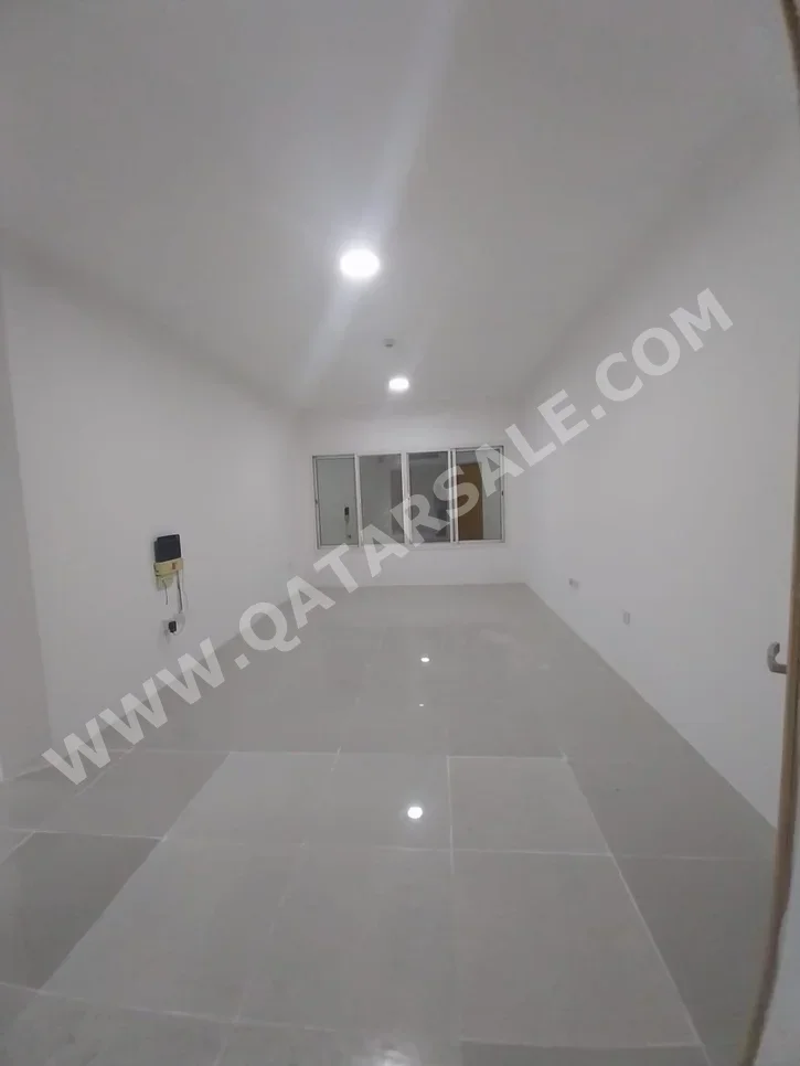 2 Bedrooms  Apartment  in Doha -  Al Mansoura  Not Furnished