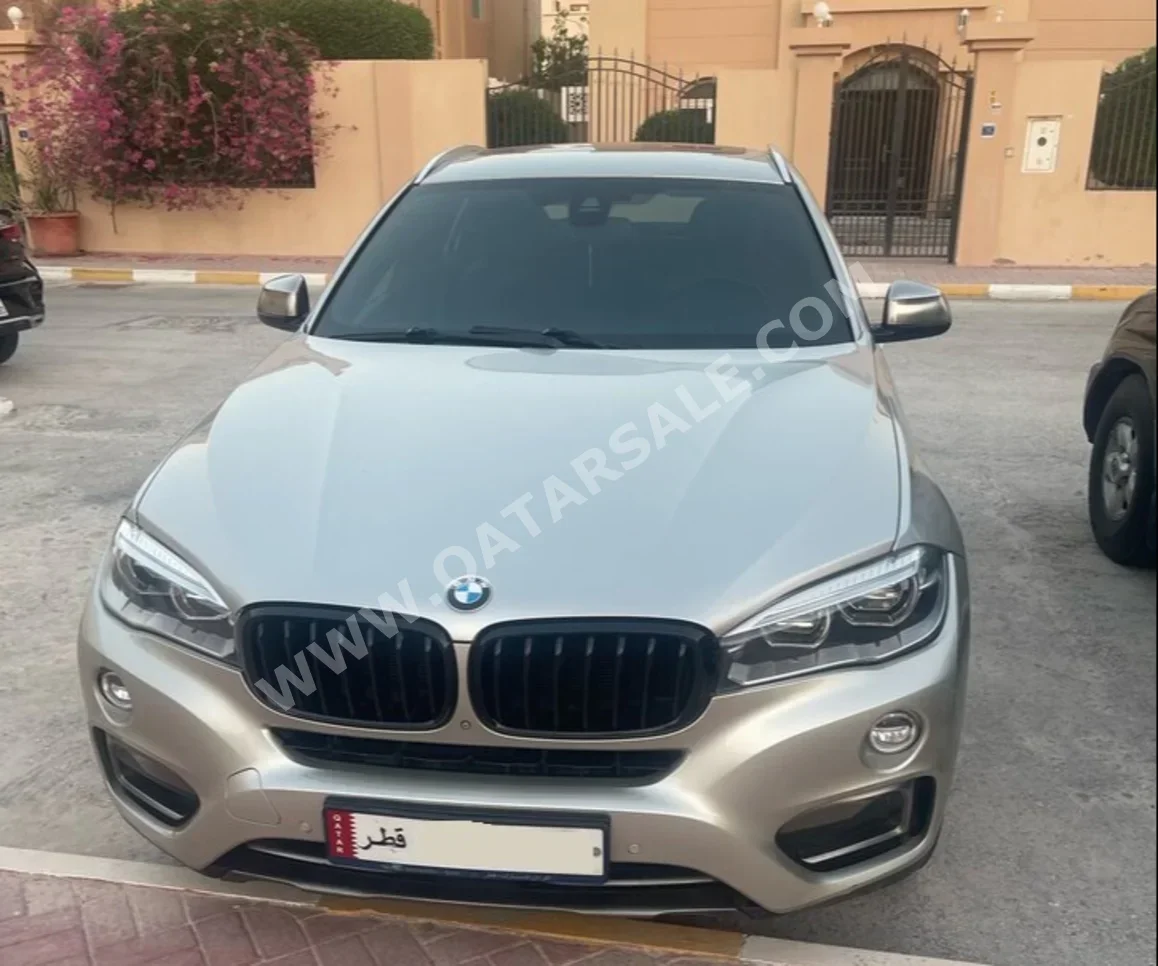 BMW  X-Series  X6 50i  2015  Automatic  134,000 Km  8 Cylinder  Four Wheel Drive (4WD)  SUV  Silver