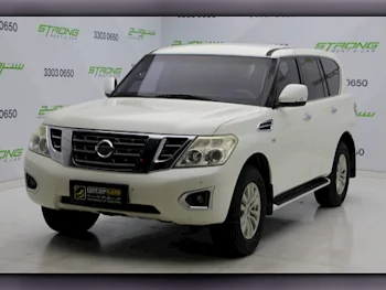 Nissan  Patrol  SE  2014  Automatic  171,000 Km  8 Cylinder  Four Wheel Drive (4WD)  SUV  White