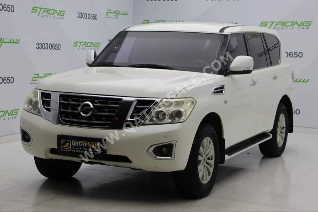  Nissan  Patrol  SE  2014  Automatic  171,000 Km  8 Cylinder  Four Wheel Drive (4WD)  SUV  White  With Warranty