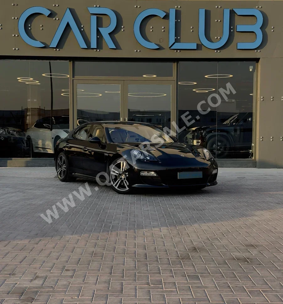 Porsche  Panamera  2013  Automatic  57٬000 Km  6 Cylinder  Rear Wheel Drive (RWD)  Sedan  Black